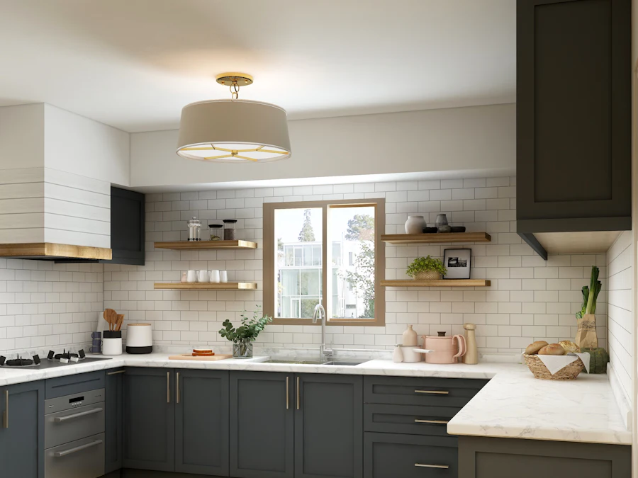 Cocina con muebles oscuros y encimera clara